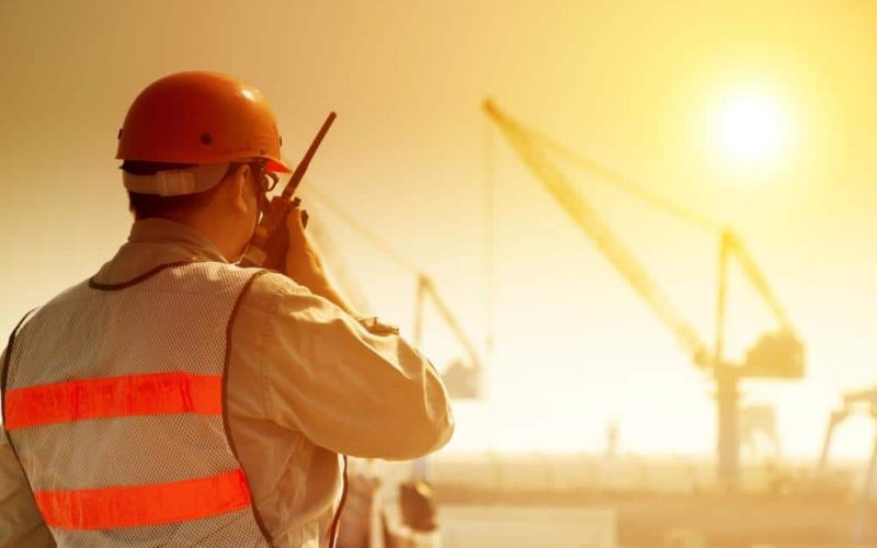 utility worker using radio